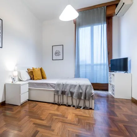 Rent this 4 bed room on Via Enrico Besana in 20135 Milan MI, Italy