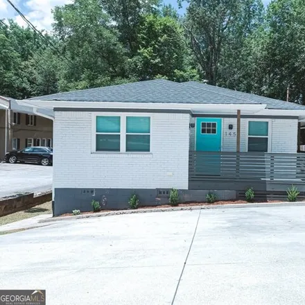 Rent this 1 bed house on 1453 Mercer Ave in College Park, Georgia