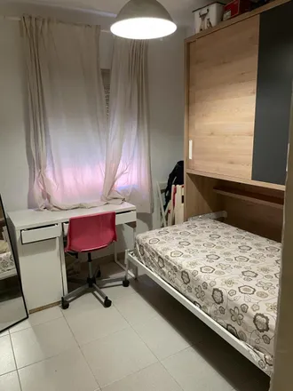 Rent this 2 bed room on Madrid in Calle Pilar Cavero, 28027 Madrid