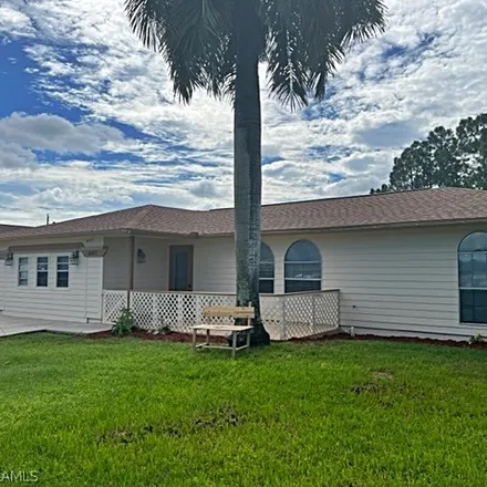 Buy this 4 bed house on 3207 1st Street Southwest in Lehigh Acres, FL 33976