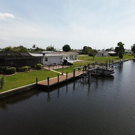 Buy this 4 bed house on 126 Godfrey Avenue Northeast in Port Charlotte, FL 33952