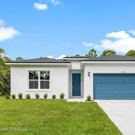 Buy this 4 bed house on 286 Delake Road Northwest in Palm Bay, FL 32907