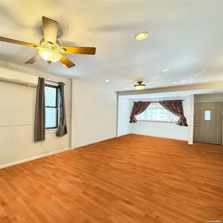 Image 4 - 80-09 64th Lane, New York, NY 11385, USA - House for sale