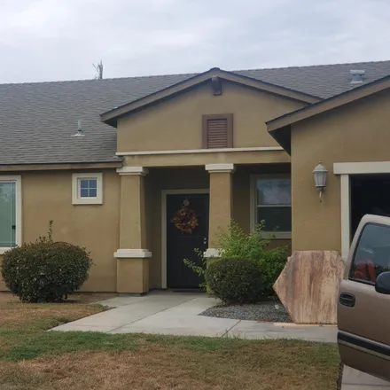 Buy this 4 bed house on 1071 Timothy Avenue in Dinuba, CA 93618