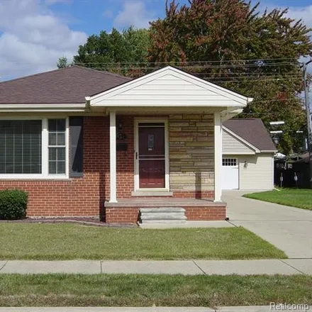 Buy this 3 bed house on 631 Saint Johns Street in Wyandotte, MI 48192