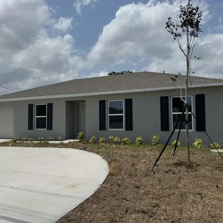 Rent this 3 bed apartment on Southwest Becker Road in Port Saint Lucie, FL 34953