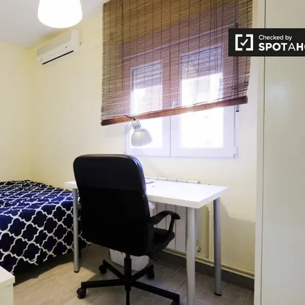 Rent this 4 bed room on Madrid in Calle Nardos, 2