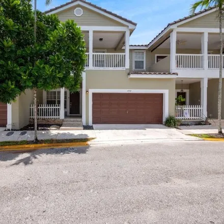 Buy this 4 bed house on 10548 Northwest 56th Drive in Kensington Manor, Coral Springs