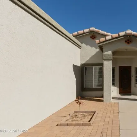 Buy this 4 bed house on 7388 South Bull Rider Avenue in Tucson, AZ 85747