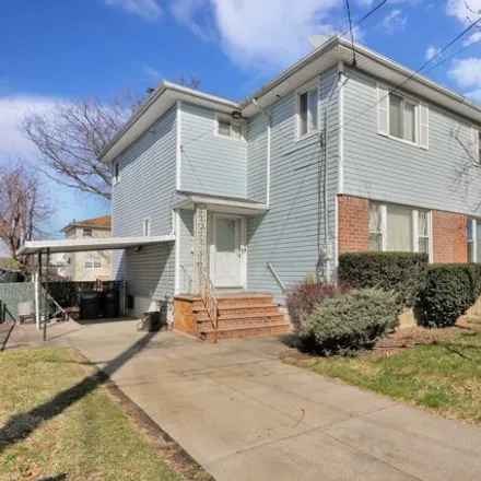 Buy this 3 bed house on 235-03 148th Avenue in New York, NY 11422