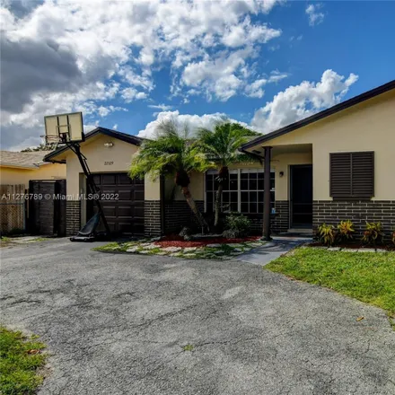 Buy this 3 bed house on West Country Club Drive in Palm Beach County, FL 33428