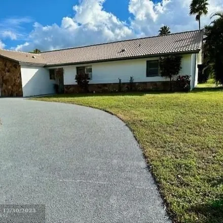 Image 2 - 10994 Lakeview Drive, Coral Springs, FL 33071, USA - House for sale