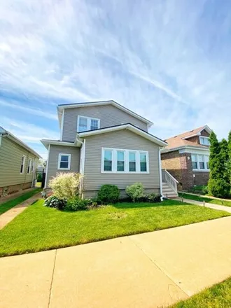Buy this 4 bed house on 5709 West Henderson Street in Chicago, IL 60634
