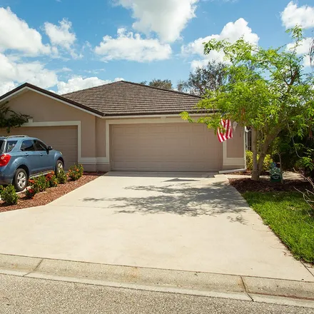 Buy this 2 bed townhouse on Carnaby Court in Lehigh Acres, FL 33973