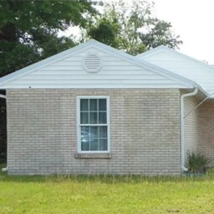 Rent this 3 bed house on 2502 Vaughn Avenue in Deltona, FL 32725