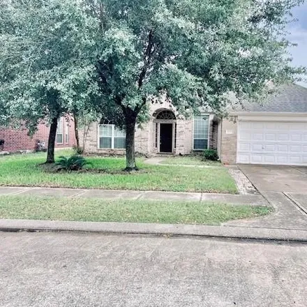 Rent this 4 bed house on 10064 Barr Lake Drive in Harris County, TX 77095
