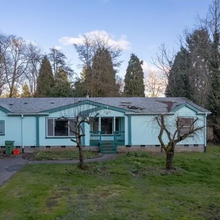 Buy this 4 bed house on 11606 Southeast Wood Avenue in Milwaukie, OR 97222