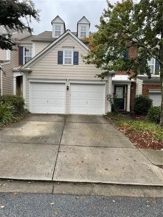 Rent this 3 bed townhouse on Gainesway Court in Adams Crossroads, Gwinnett County
