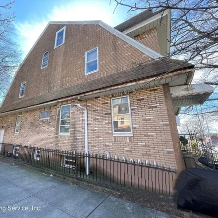 Buy this 6 bed house on 105 Bay 17th Street in New York, NY 11214
