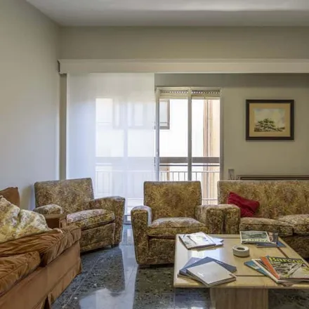 Rent this 6 bed room on Carrer de Baldoví in 46002 Valencia, Spain