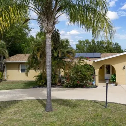 Buy this 3 bed house on 1581 Southeast Chiffon Avenue in Port Saint Lucie, FL 34952