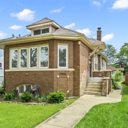 Buy this 4 bed house on 11323 S Lowe Ave in Chicago, Illinois
