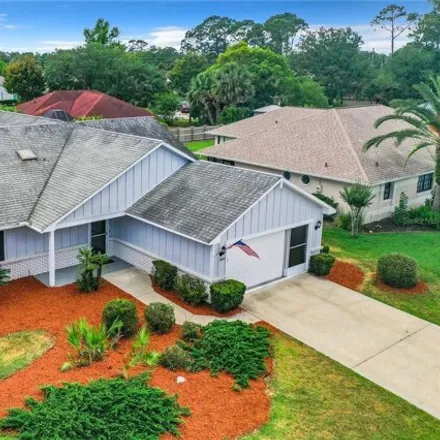 Buy this 3 bed house on The Grand Club - Pine Lakes Course in Willard Place, Palm Coast