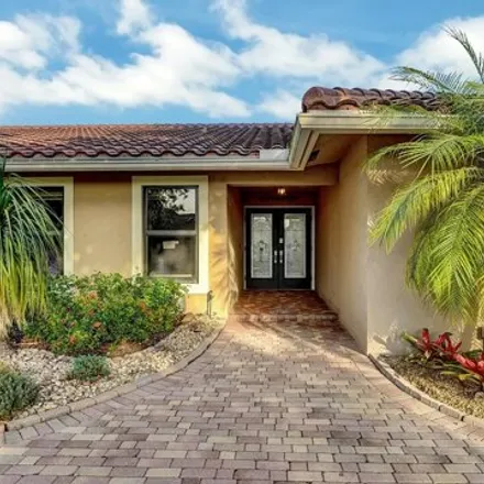 Buy this 4 bed house on 329 Northwest 105th Terrace in Coral Springs, FL 33071