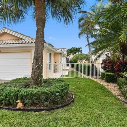 Buy this 2 bed townhouse on 2075 Guadeloupe Drive in Wellington, FL 33414