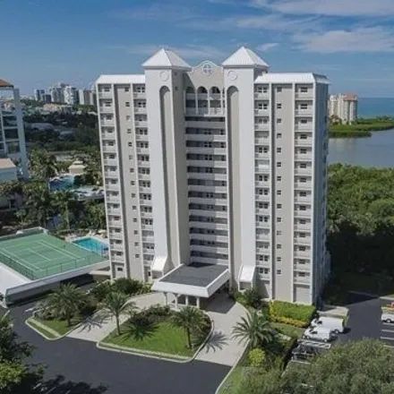 Rent this 2 bed condo on Serendipity Drive in Pelican Bay, FL 34108
