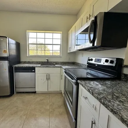 Rent this 2 bed condo on 712 Cypress Lane in Crystal Lake, Deerfield Beach