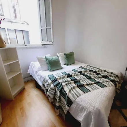 Rent this 11 bed room on Calle de Guillermo Rolland in 3, 28013 Madrid