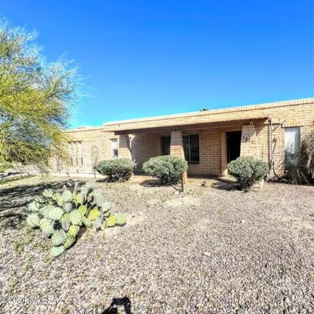 Rent this 6 bed house on 1286 West Whispering Hills Drive in Flowing Wells, AZ 85704