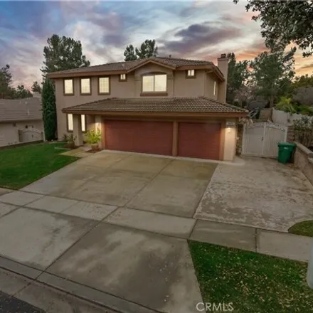 Rent this 4 bed house on 1472 Pinewood Dr in Corona, California