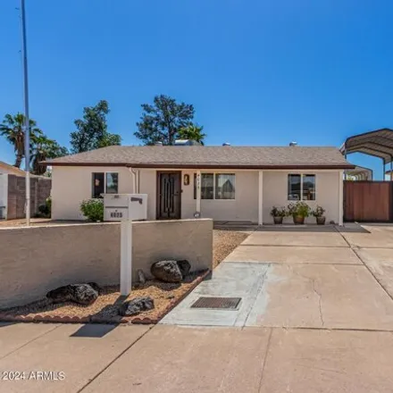 Buy this 3 bed house on 4025 E Surrey Ave in Phoenix, Arizona