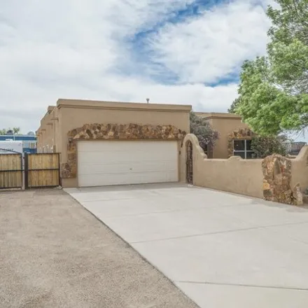 Buy this 4 bed house on 9463 Vista Clara Loop Northwest in North Valley, Bernalillo County