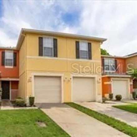 Rent this 3 bed townhouse on 12707 Somerset Oaks Street in Orange County, FL 32828