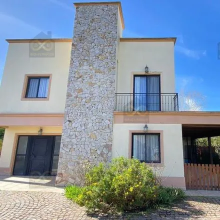 Rent this 4 bed house on unnamed road in Partido del Pilar, B1631 BUI Villa Rosa