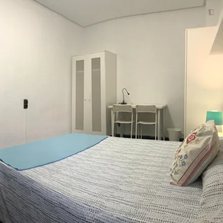 Rent this 8 bed room on Plaça de la Setmana Santa Marinera in 46011 Valencia, Spain
