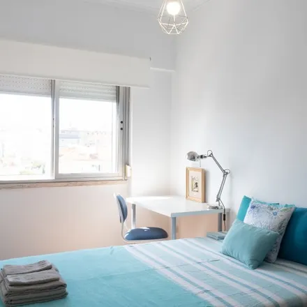 Rent this 4 bed room on Rua Elias Garcia in 2700-598 Mina de Água, Portugal