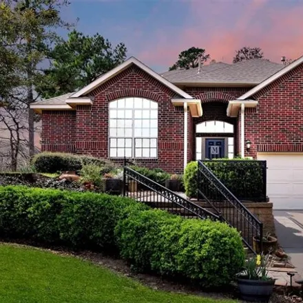 Buy this 4 bed house on 1909 Hill Manor in Conroe, TX 77304