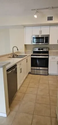 Rent this 2 bed condo on Lyons Road in Coconut Creek, FL 33073