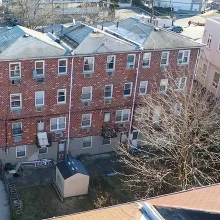 Buy this 8 bed townhouse on 2048 Ralph Avenue in New York, NY 11234