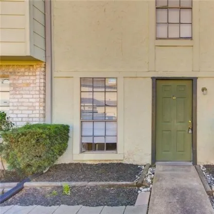 Rent this 2 bed townhouse on Victorian Village Drive in Houston, TX 77071