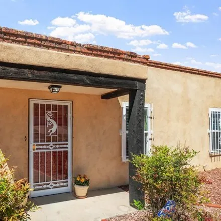 Buy this 4 bed house on 12473 Lexington Avenue Northeast in Enchanted Park, Albuquerque