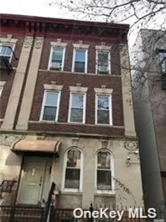 Buy this 9 bed house on 198 Hawthorne Street in New York, NY 11225