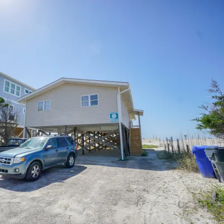 Buy this 4 bed house on 5201 East Beach Drive in Oak Island, Brunswick County