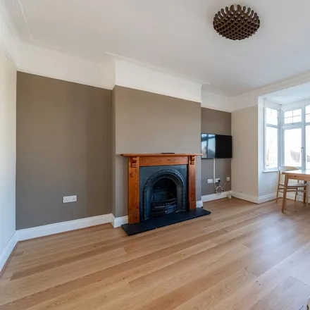 Rent this 2 bed apartment on 80 Alric Avenue in London, KT3 4JW