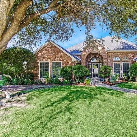 Buy this 4 bed house on 1701 Palomino Drive in Rowlett, TX 75088