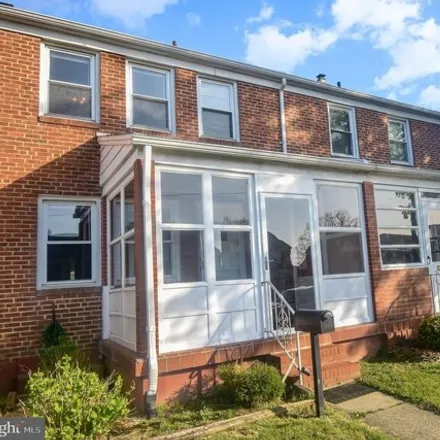 Rent this 3 bed townhouse on 7303 Bridgewood Dr in Baltimore, Maryland